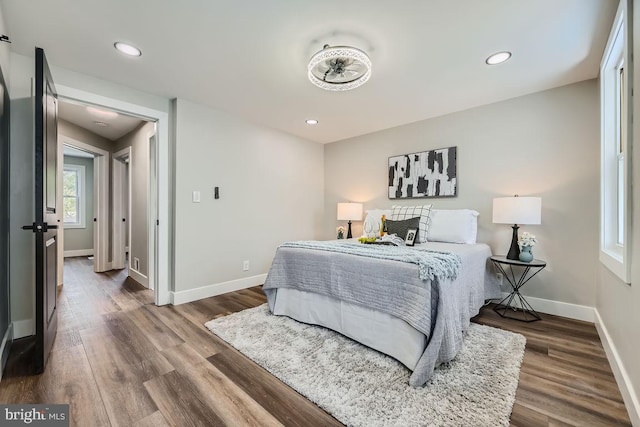 bedroom with hardwood / wood-style floors