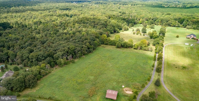 bird's eye view featuring a view of trees