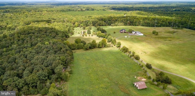 aerial view featuring a rural view and a forest view