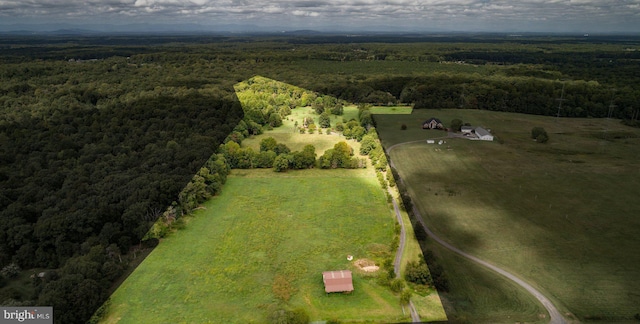 drone / aerial view with a rural view and a forest view