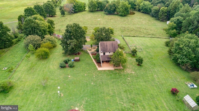 birds eye view of property featuring a rural view