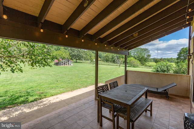 view of patio featuring outdoor dining area