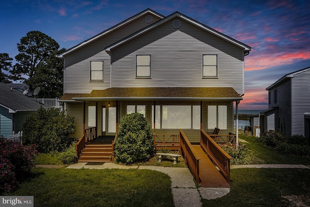 view of front of home featuring a yard