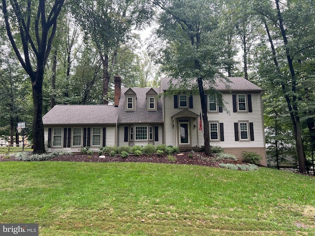 view of front of property featuring a front yard