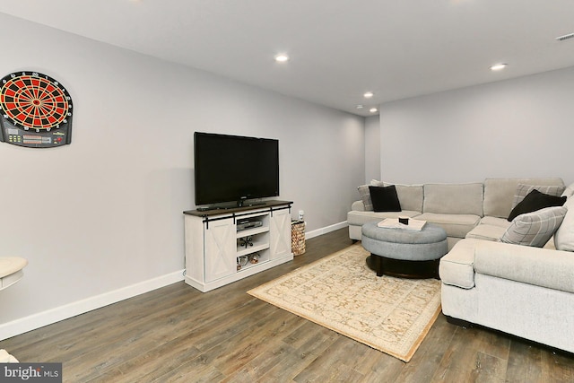 living room featuring dark hardwood / wood-style floors