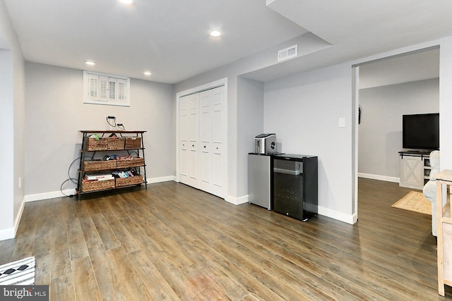 basement with wood-type flooring