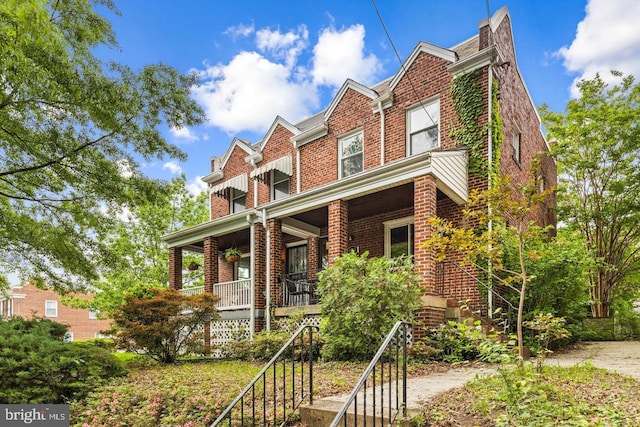 view of front of home featuring covered porch