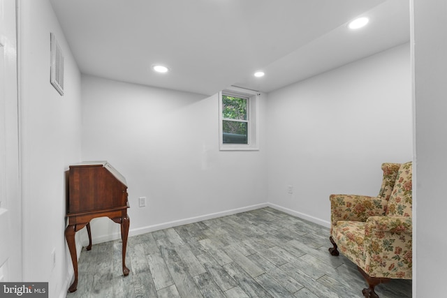 sitting room with light hardwood / wood-style floors