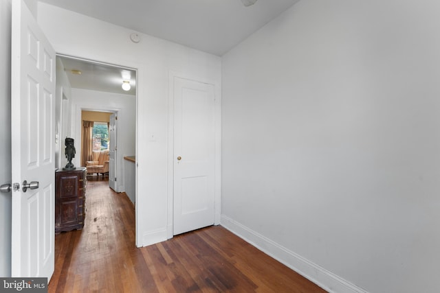 hall featuring dark hardwood / wood-style floors