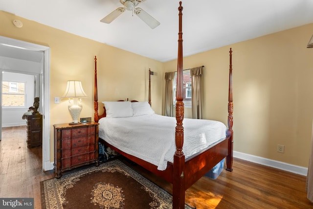 bedroom featuring hardwood / wood-style floors and ceiling fan