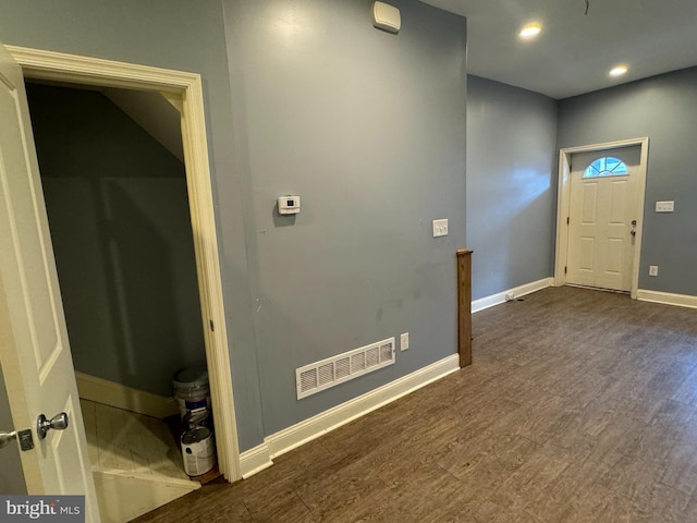 interior space with dark hardwood / wood-style flooring