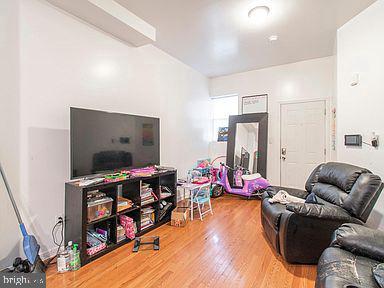 living room with wood-type flooring