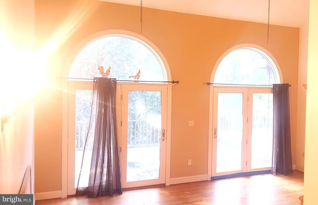 doorway with light hardwood / wood-style flooring