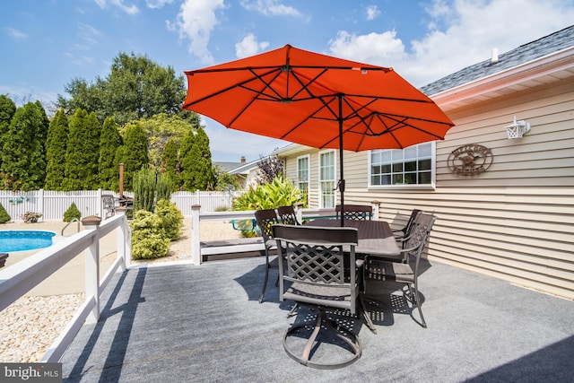 view of patio / terrace featuring a fenced in pool