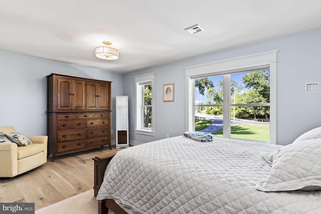 bedroom featuring light hardwood / wood-style flooring