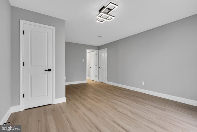 empty room featuring light hardwood / wood-style flooring