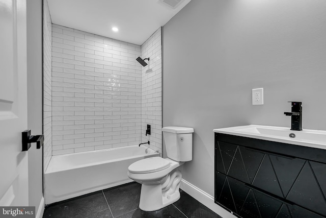 full bathroom with toilet, tiled shower / bath, vanity, and tile patterned floors