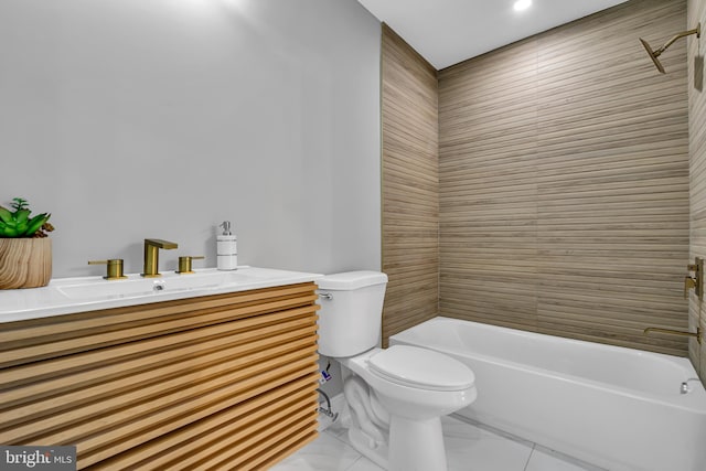 full bathroom with tiled shower / bath combo, tile patterned flooring, toilet, and vanity