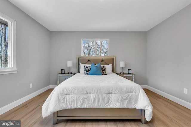 bedroom featuring light hardwood / wood-style floors