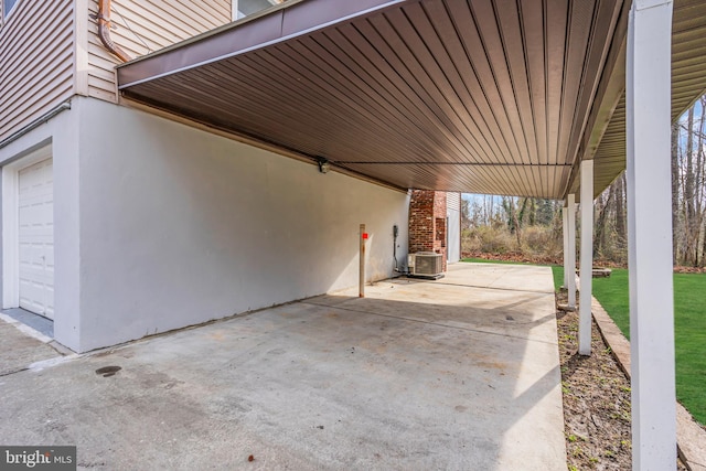 view of patio / terrace featuring a garage