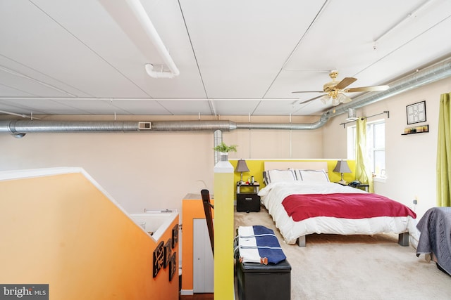 carpeted bedroom featuring visible vents