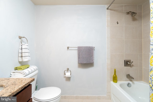 bathroom with toilet, shower / tub combo, and vanity