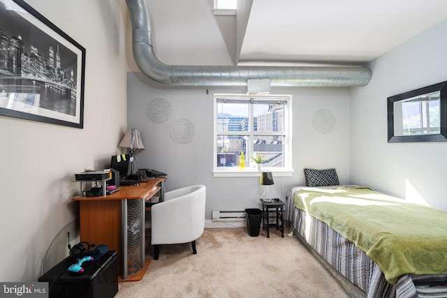 bedroom with light carpet and baseboard heating