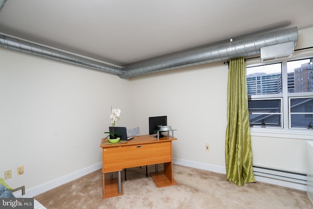 office area featuring carpet floors, baseboards, and a baseboard heating unit