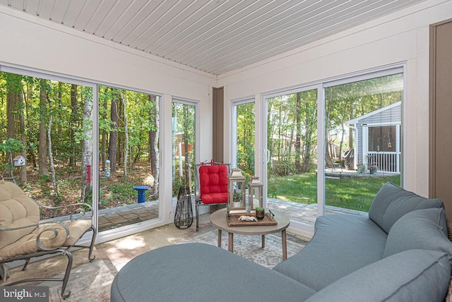 sunroom with wooden ceiling