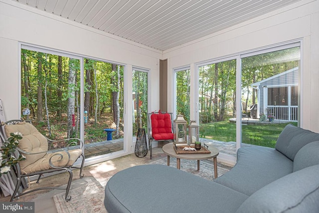 sunroom with wood ceiling