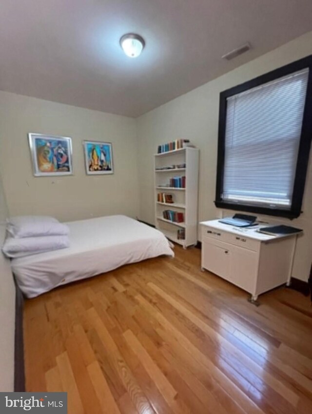 basement with dark wood-type flooring