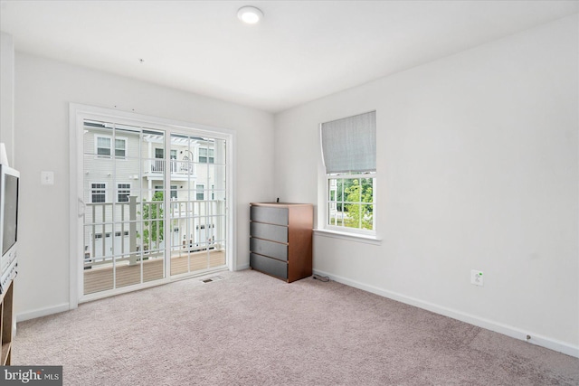 view of carpeted spare room