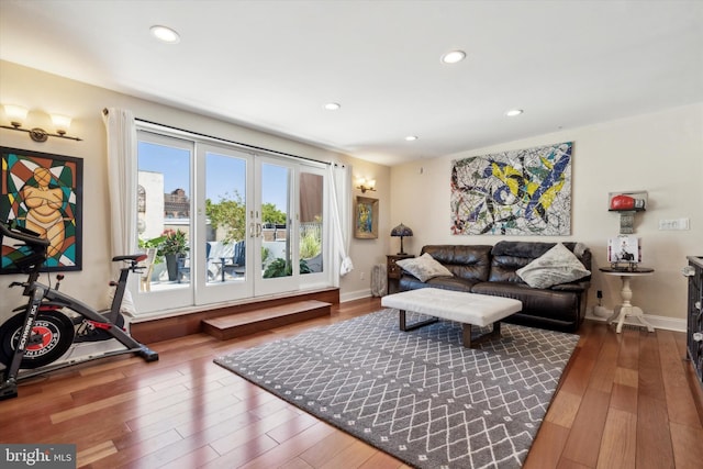 living room featuring hardwood / wood-style flooring and french doors