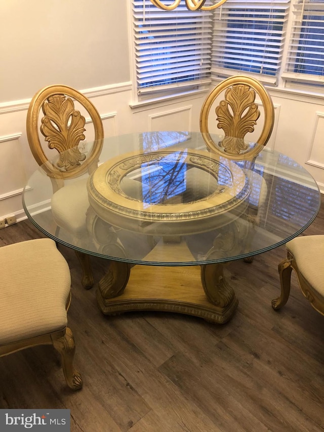 dining space featuring hardwood / wood-style flooring