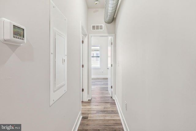 hall with light wood-type flooring