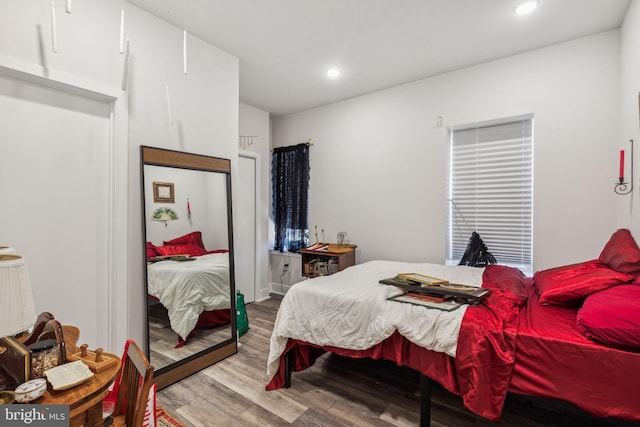 bedroom with light wood-type flooring