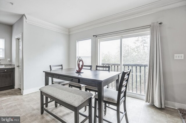 carpeted office space with crown molding and french doors