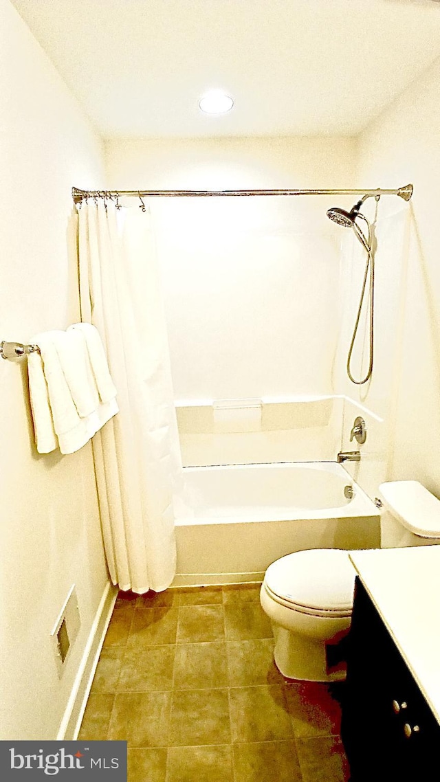 full bathroom featuring vanity, toilet, and shower / tub combo