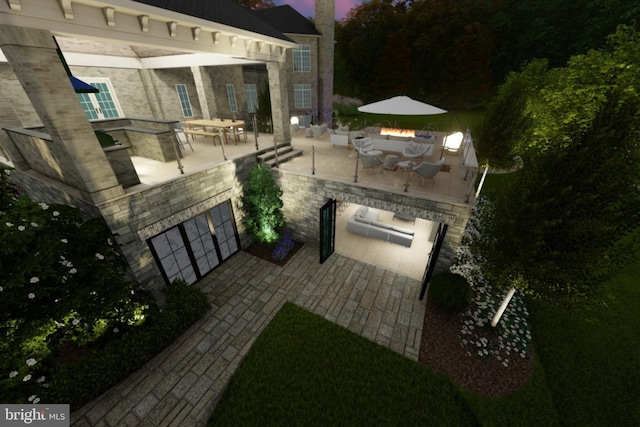 view of patio / terrace featuring an outdoor kitchen and outdoor dining space