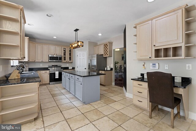 dining space featuring ceiling fan, a skylight, and light tile patterned floors