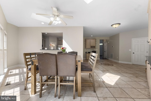 dining area featuring recessed lighting, ceiling fan, baseboards, and light tile patterned floors