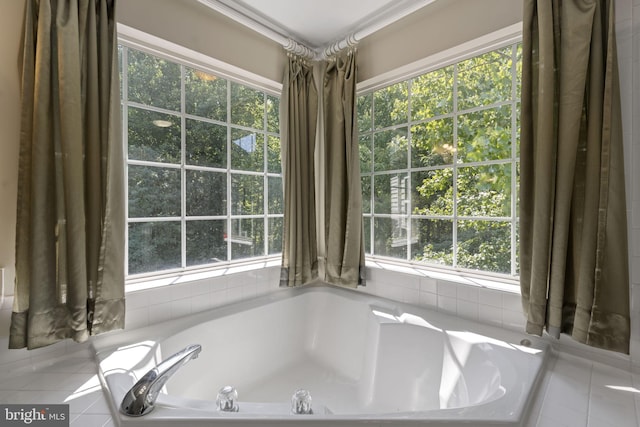 bathroom featuring a relaxing tiled tub