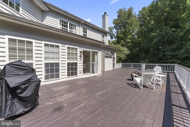 deck featuring outdoor dining area