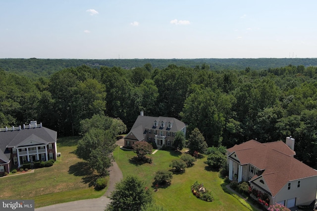 aerial view with a wooded view