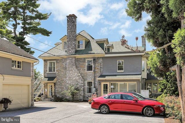 view of front of house with a garage