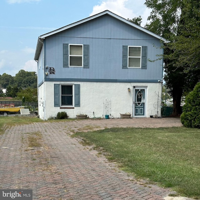 front of property with a front yard