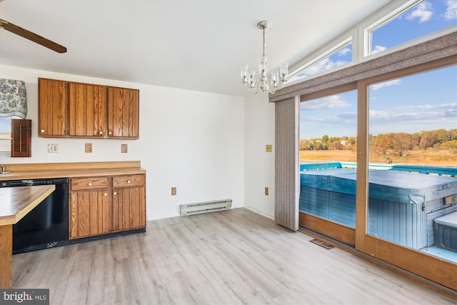 kitchen featuring brown cabinetry, decorative light fixtures, dishwasher, and baseboard heating