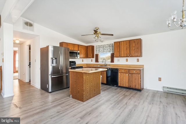 kitchen with visible vents, a kitchen island, brown cabinets, light countertops, and black appliances