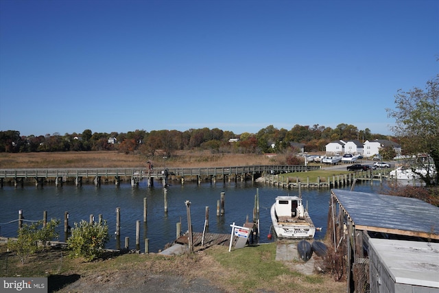 view of dock with a water view