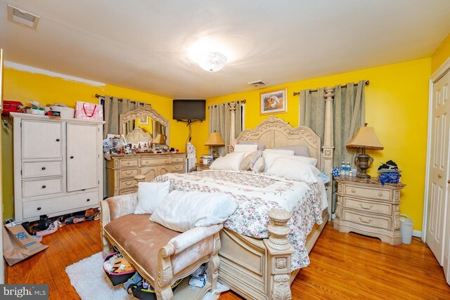 bedroom featuring hardwood / wood-style floors